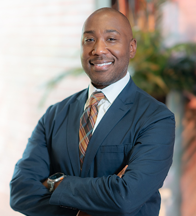 Justin Bailey, Esq. - General Counsel & Chief Legal Officer